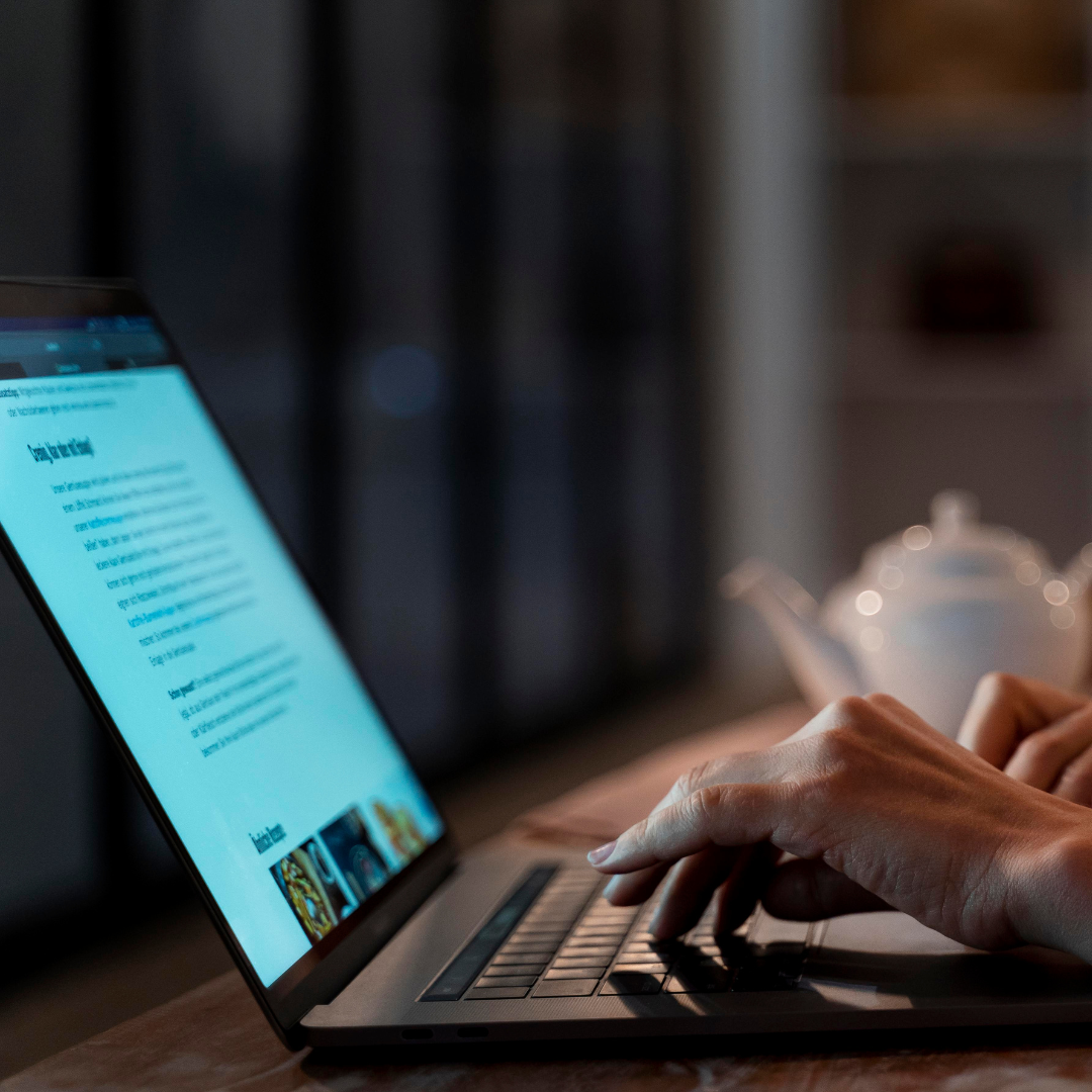 blog imge person using laptop illustrating content optimization