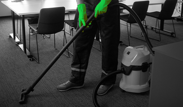 envida worker doing specialised cleaning in dubai with vaccume cleaner